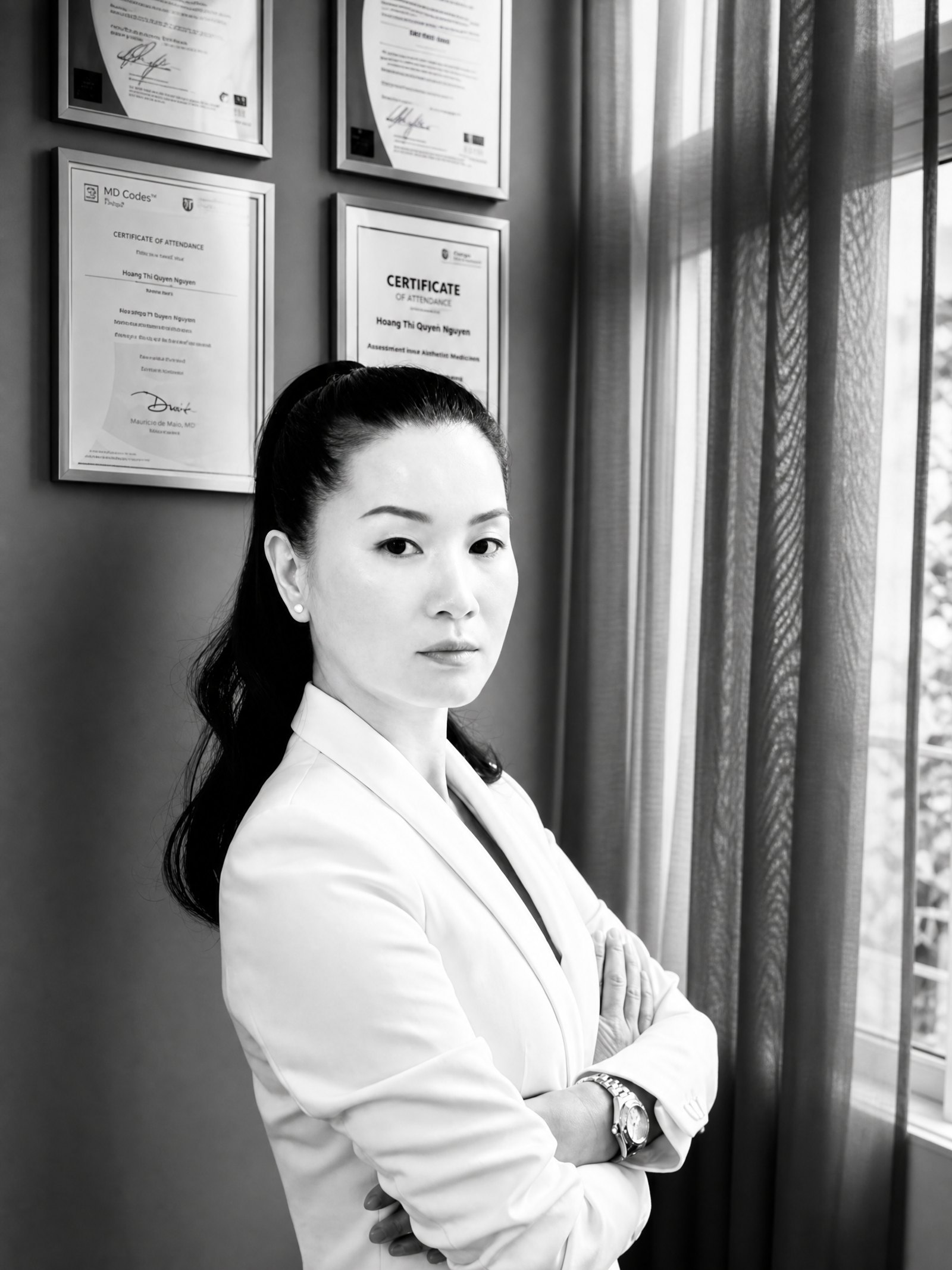 Dr. Quyen Nguyen foran certifikater